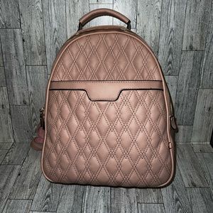 Faux leather quilted back pack purse